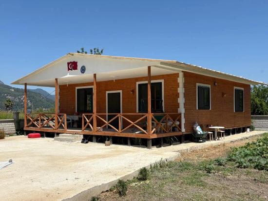 Dalyan Karadağ Mevkiinde 2500m2 Tarla İçerisinde 120m2 Müstakil Ahşap Ev